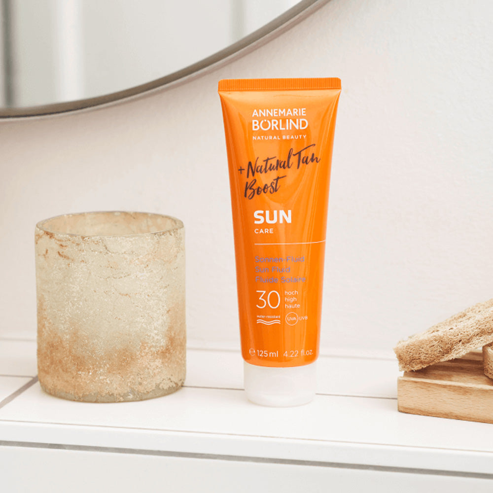 SUN CARE Sun Fluid Natural Tan Boost Spf30